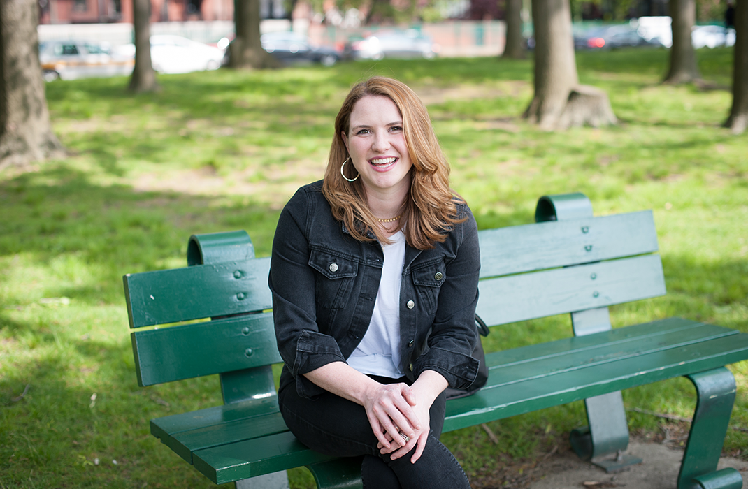 female patient sitting in bench in park